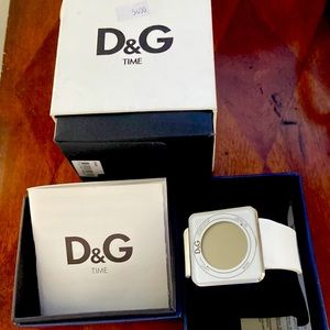 Watch by D&G.  Purchased on trip to Middle East.  White band with silver trim.
